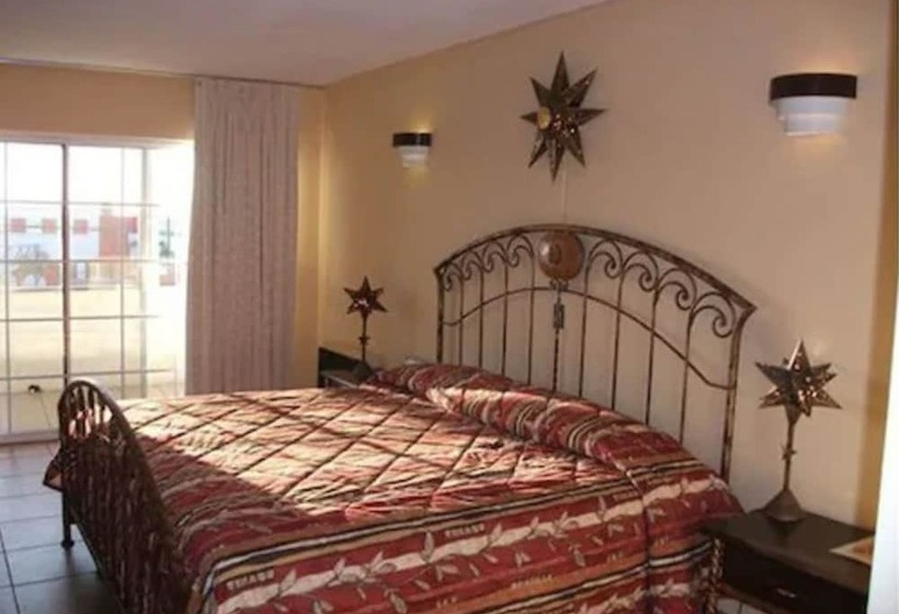 Отель Pueblito Inn