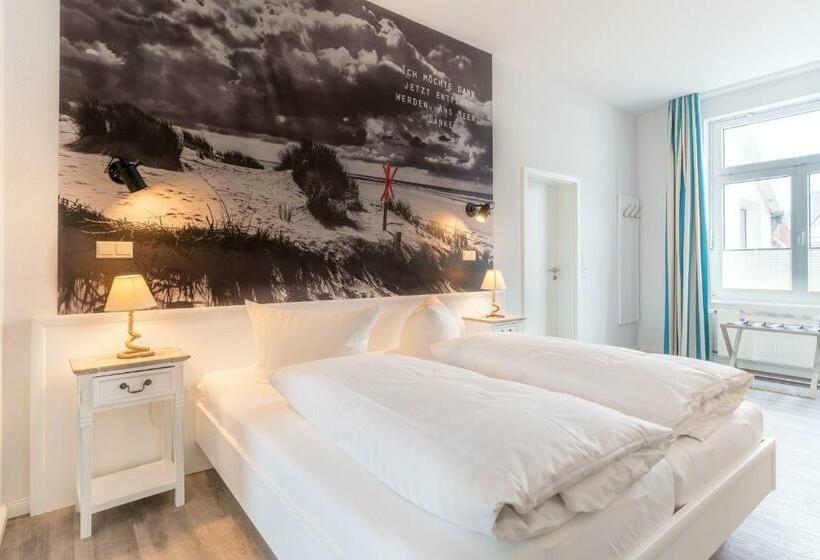 酒店 Ria‘s Beachhouse