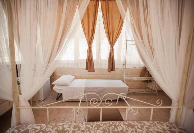 تختخواب و صبحانه I Trulli Del Tupparello