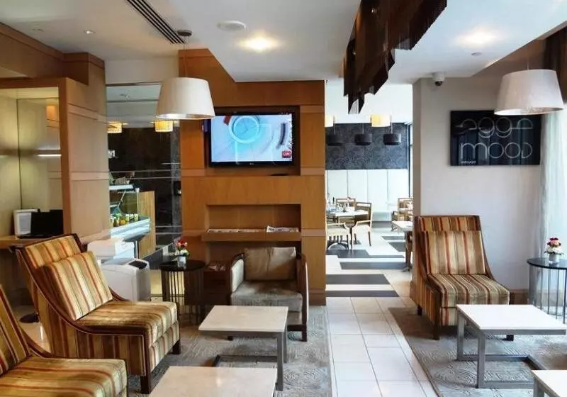 Отель Oaks Liwa Executive Suites