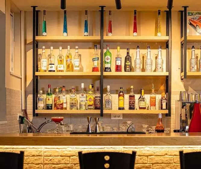 酒店 Theos Village Apartments