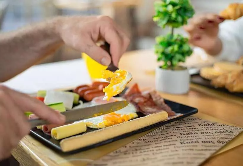 酒店 Theos Village Apartments