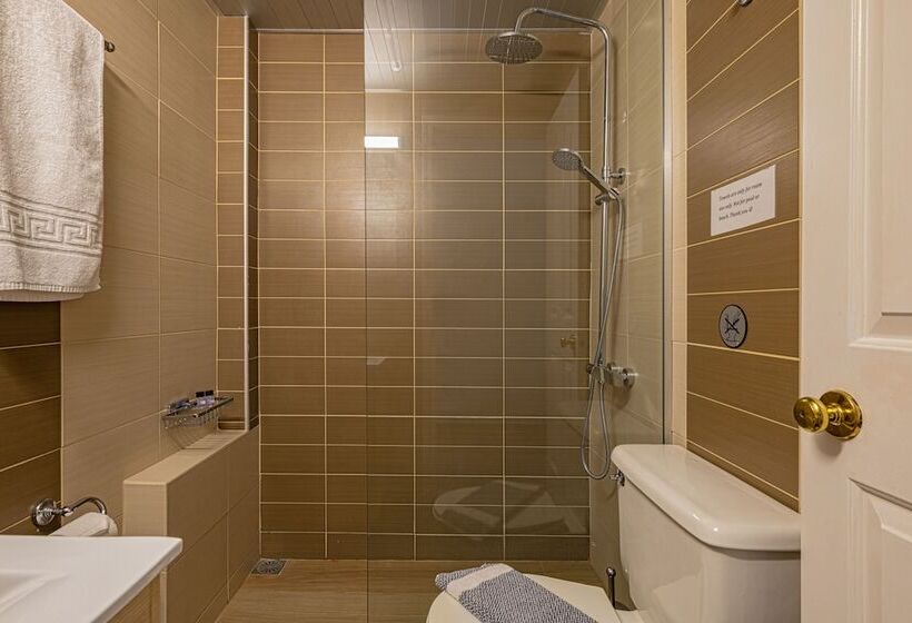 فندق Theos Village Apartments