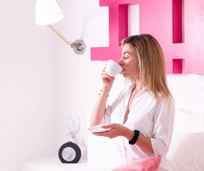 Отель Avant Garde Suites