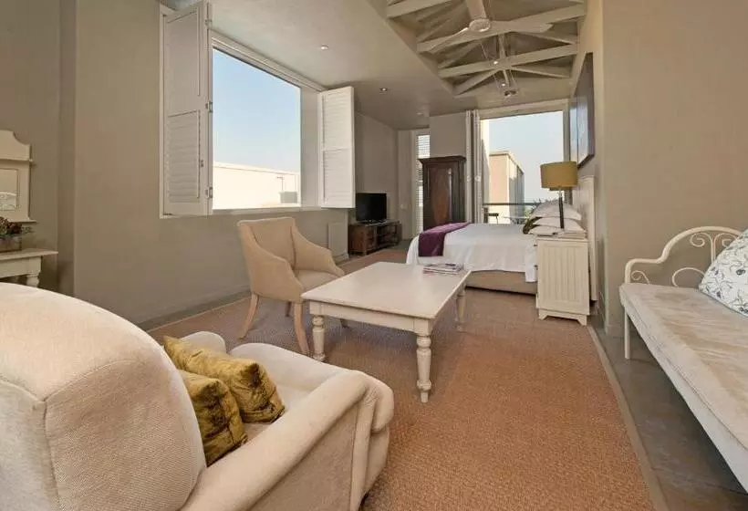 בית מלון כפרי Mosselberg On Grotto Beach