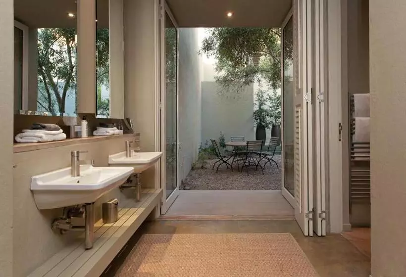 בית מלון כפרי Mosselberg On Grotto Beach