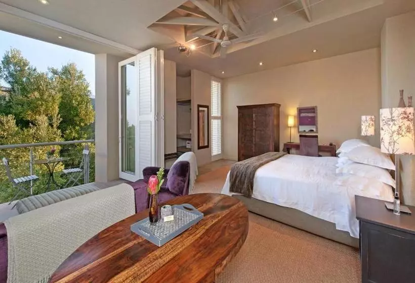 בית מלון כפרי Mosselberg On Grotto Beach