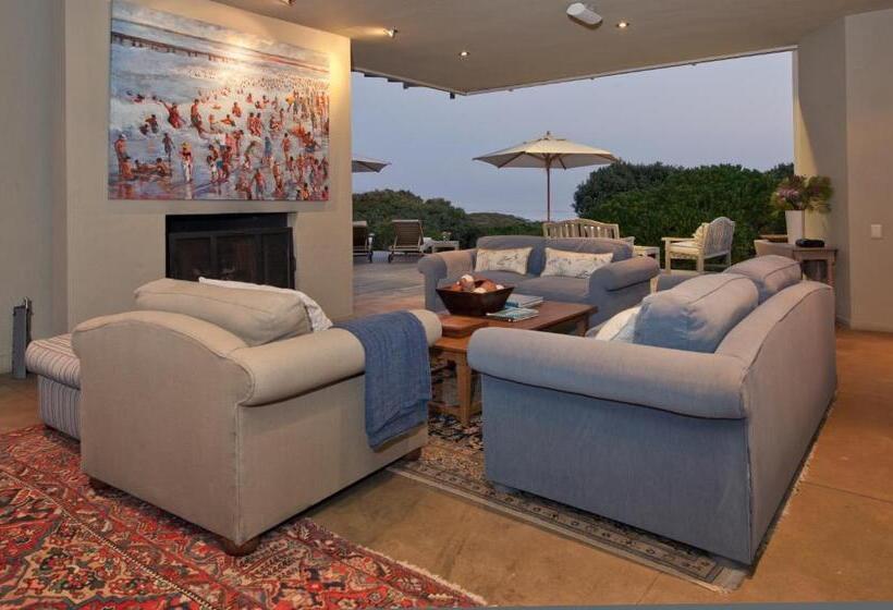 בית מלון כפרי Mosselberg On Grotto Beach