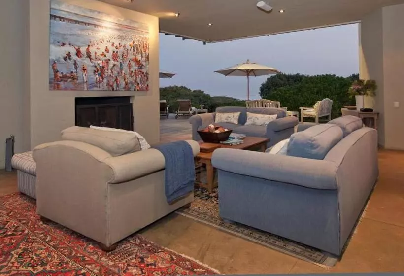 בית מלון כפרי Mosselberg On Grotto Beach