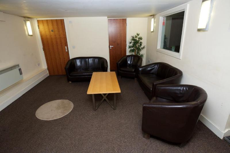 فندق صغير Cocoon @ International Inn + Apartments