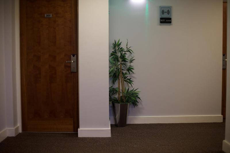 فندق صغير Cocoon @ International Inn + Apartments