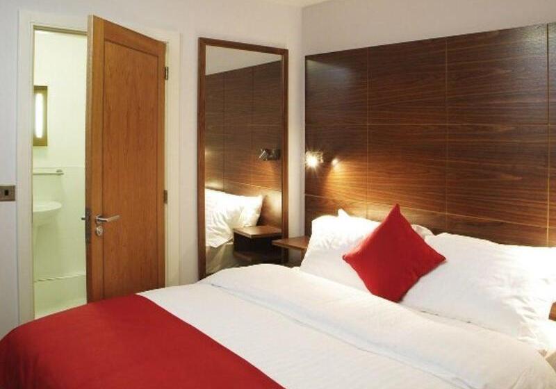 فندق صغير Cocoon @ International Inn + Apartments