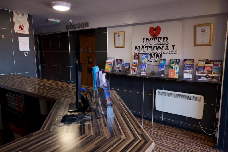 فندق صغير Cocoon @ International Inn + Apartments