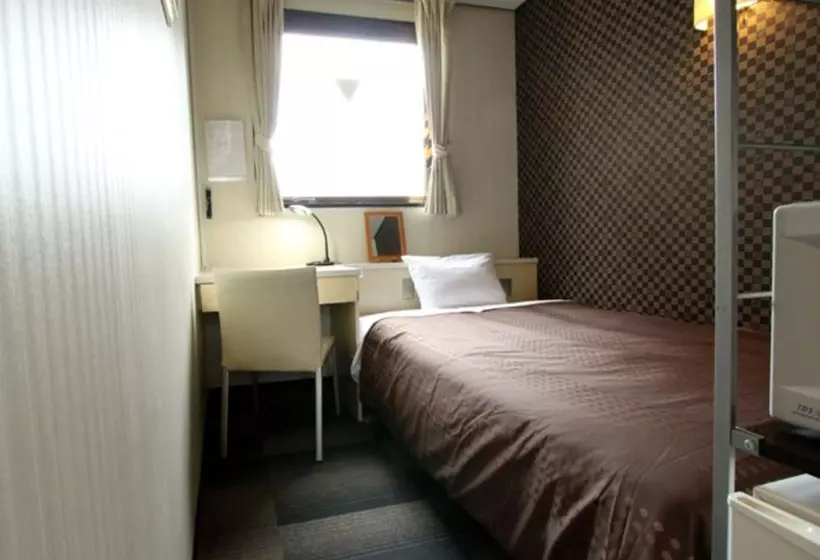 Отель Livemax Budget Shinosaka