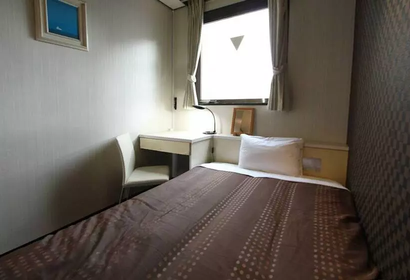 Отель Livemax Budget Shinosaka