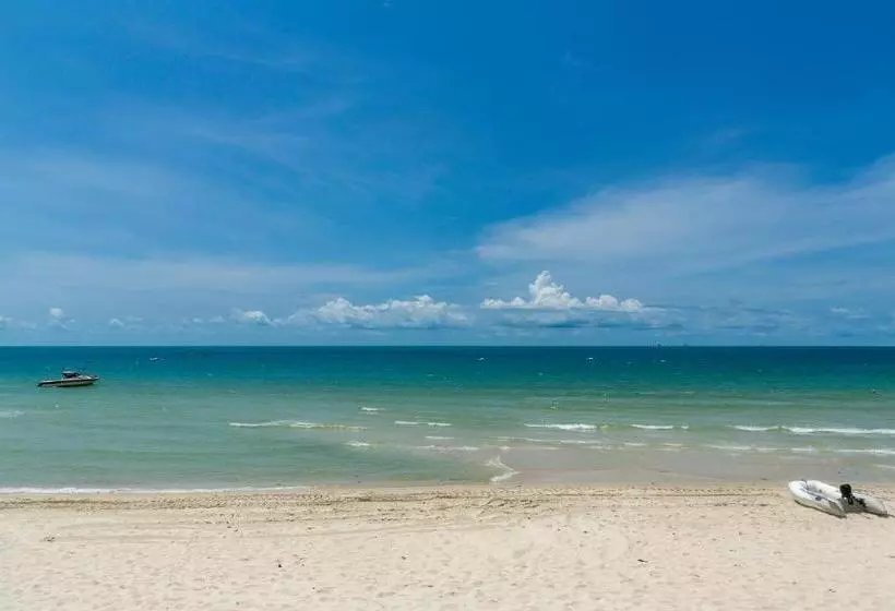 Курорт Tradewinds Cottages