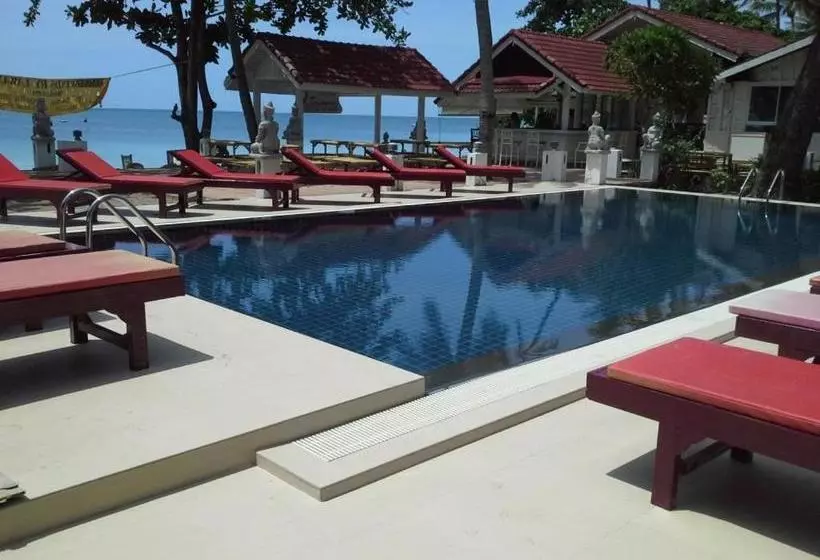 Курорт Tradewinds Cottages