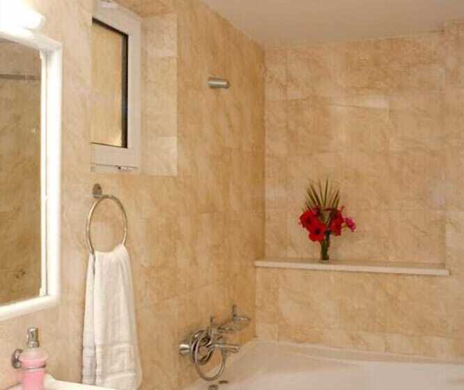 Отель Semiramis Suites