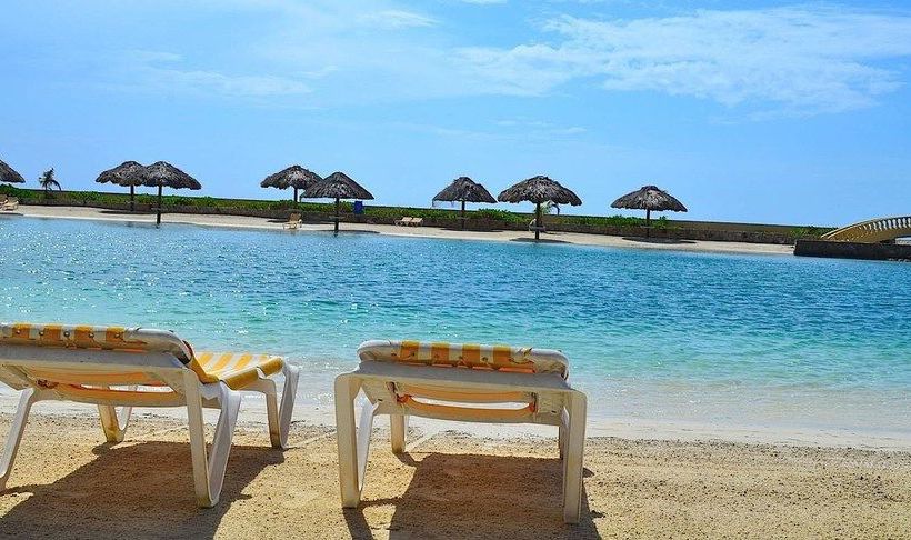 酒店 Parrot Tree Beach Resort