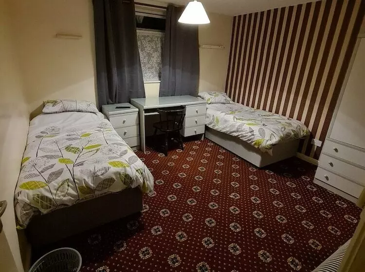 ペンション The Coach House