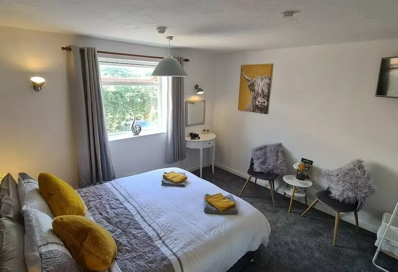 ペンション The Coach House