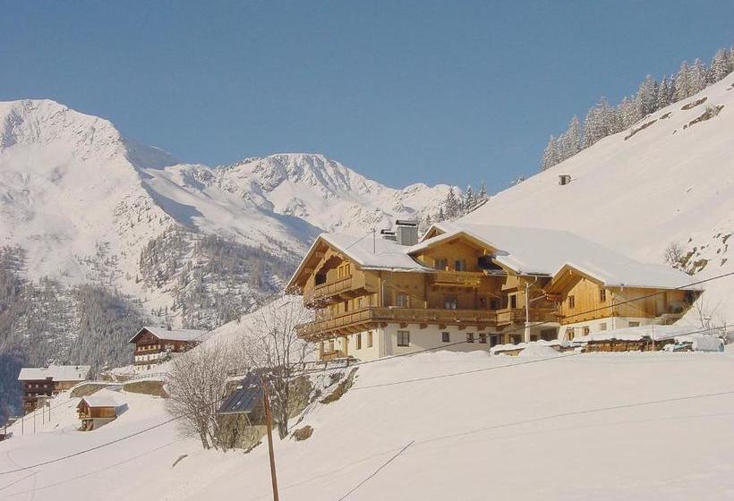 Отель Ferienwohnungen & Almhütten Gutwenger