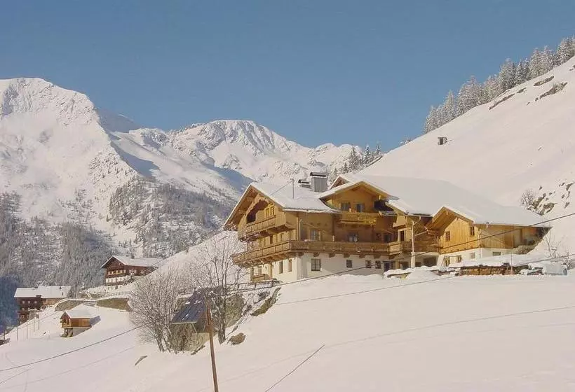 Отель Ferienwohnungen & Almhütten Gutwenger