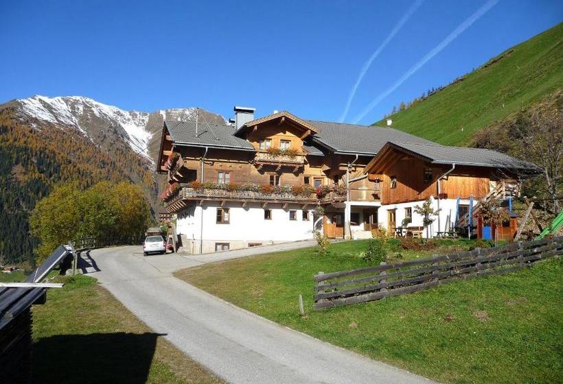 Отель Ferienwohnungen & Almhütten Gutwenger