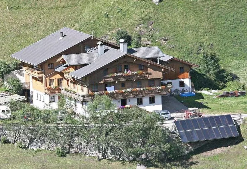 Отель Ferienwohnungen & Almhütten Gutwenger