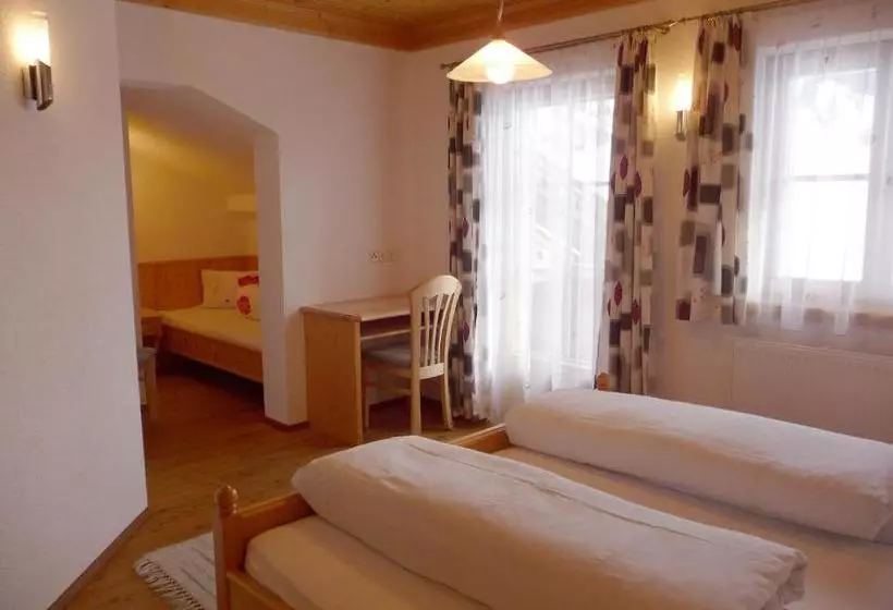 Отель Ferienwohnungen & Almhütten Gutwenger