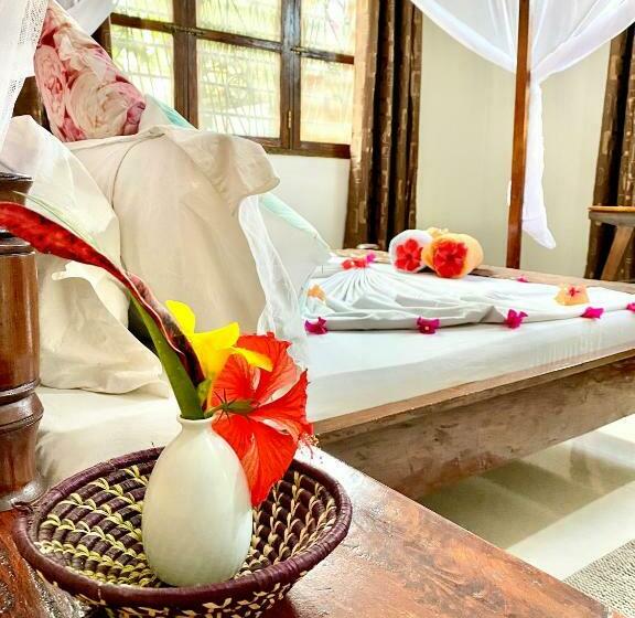 펜션 Villa Orchid Beach Guest House