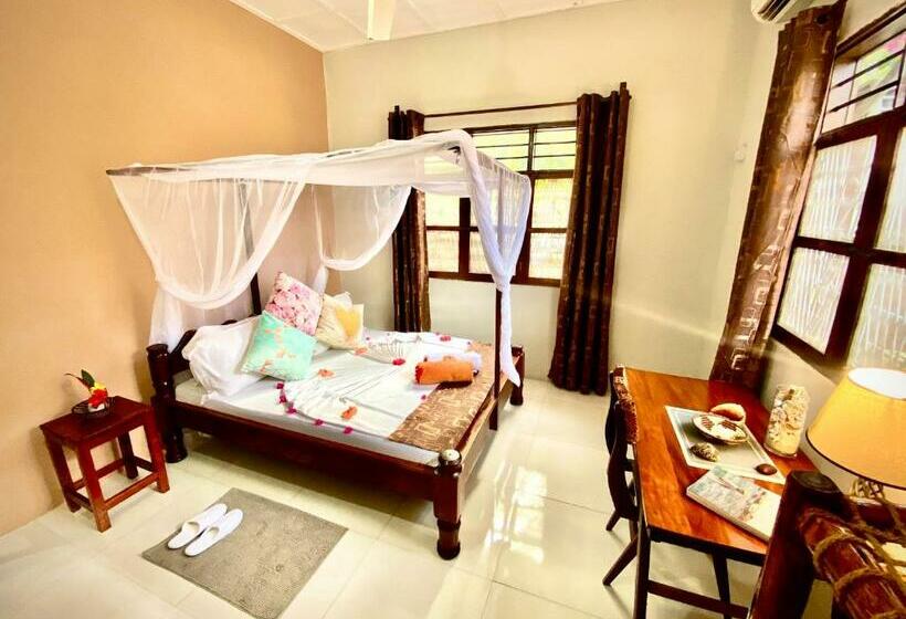 펜션 Villa Orchid Beach Guest House