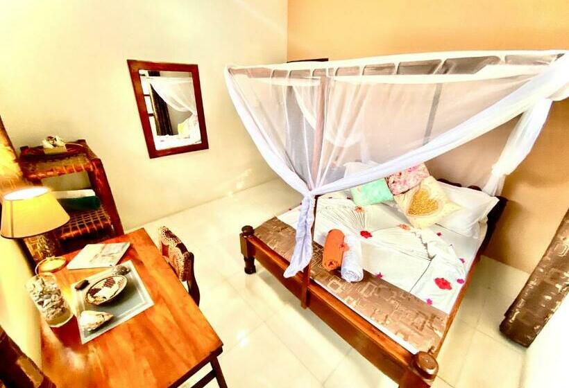 펜션 Villa Orchid Beach Guest House