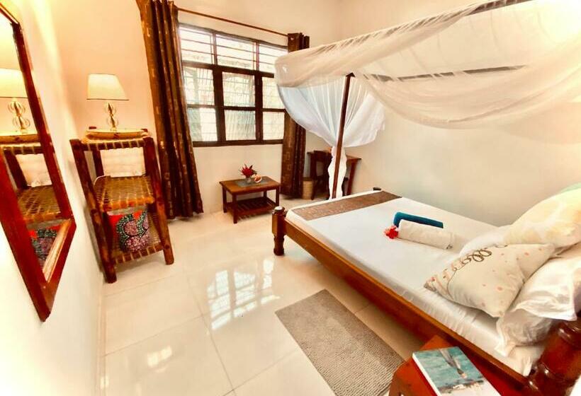 펜션 Villa Orchid Beach Guest House