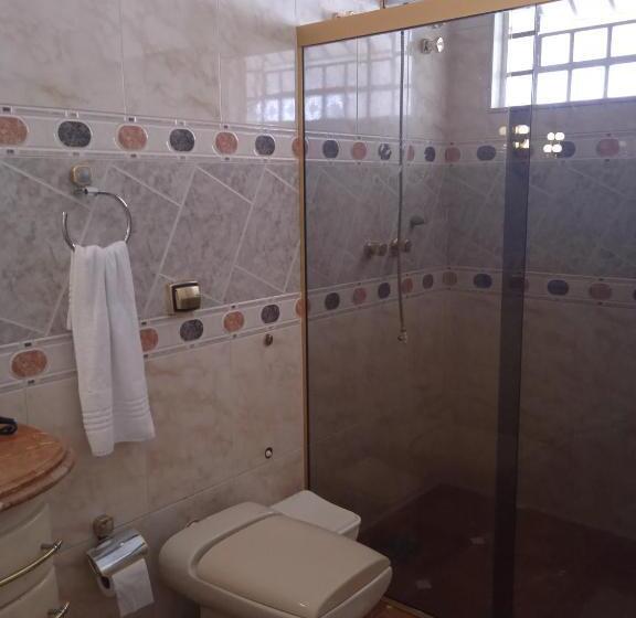 ペンション Acomodações Anfitriã