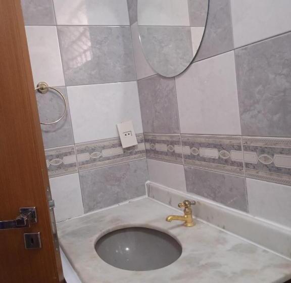 ペンション Acomodações Anfitriã