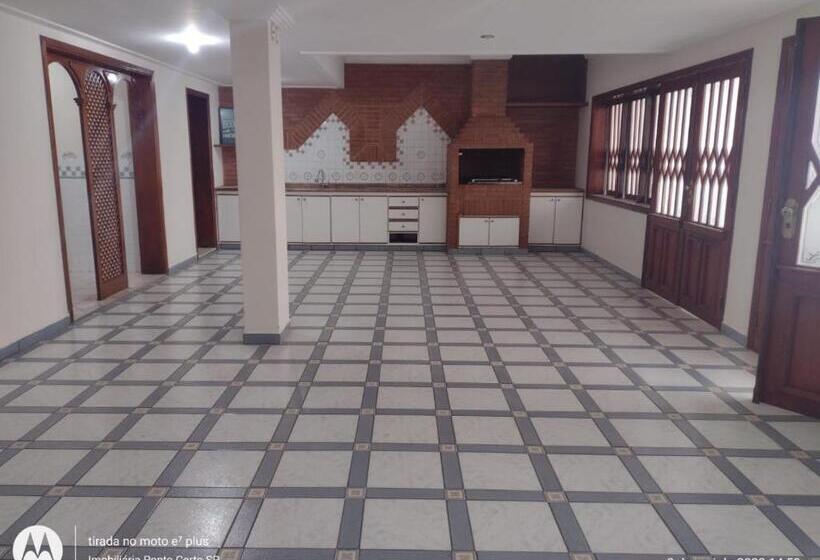 ペンション Acomodações Anfitriã