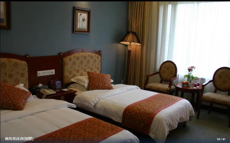 Отель Suzhou Taoyuan International Holiday