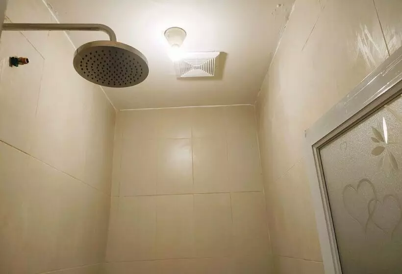 Hotelli Express O 91277 Atiq Homestay Syariah