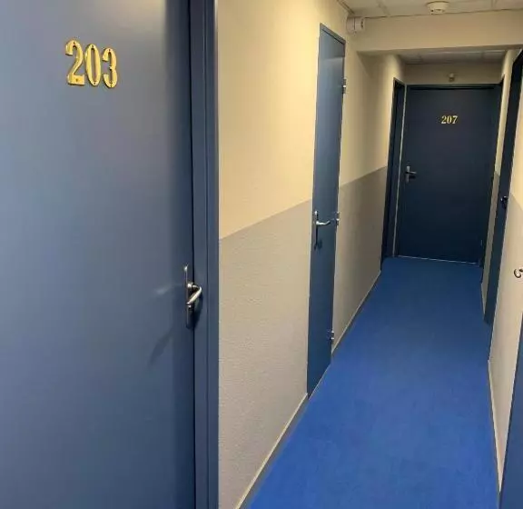 Отель Les Commercants