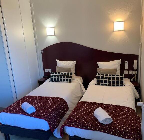 Отель Les Commercants