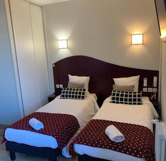 Отель Les Commercants