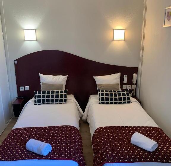 Отель Les Commercants