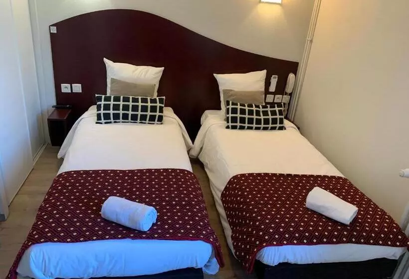 Отель Les Commercants