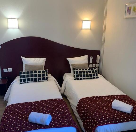 Отель Les Commercants