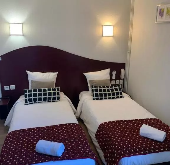 Отель Les Commercants