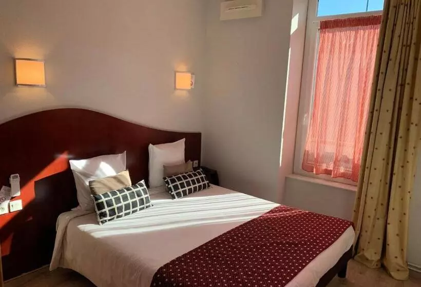 Отель Les Commercants