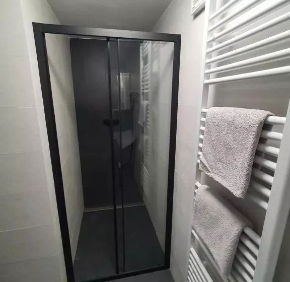 Apartmány černý Kohout