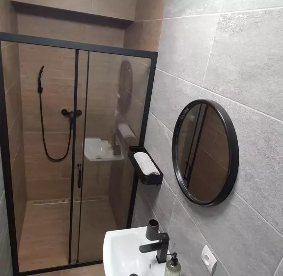 Apartmány černý Kohout