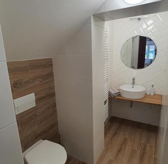 Apartmány černý Kohout
